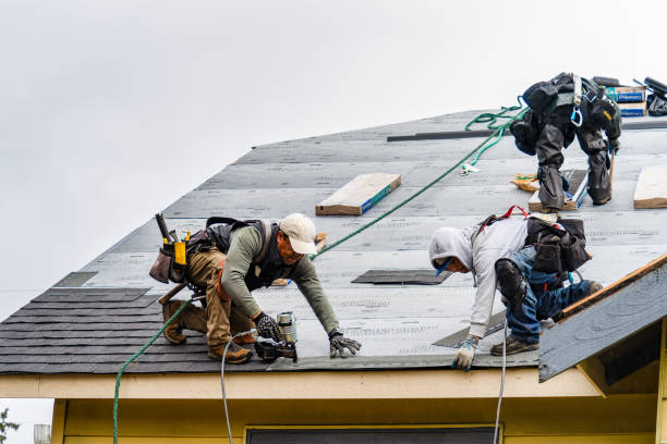 Professional Roofing technician working in West Eaton, NY